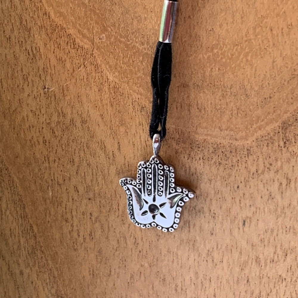 Sterling Hamsa charm necklace on a  leather cord